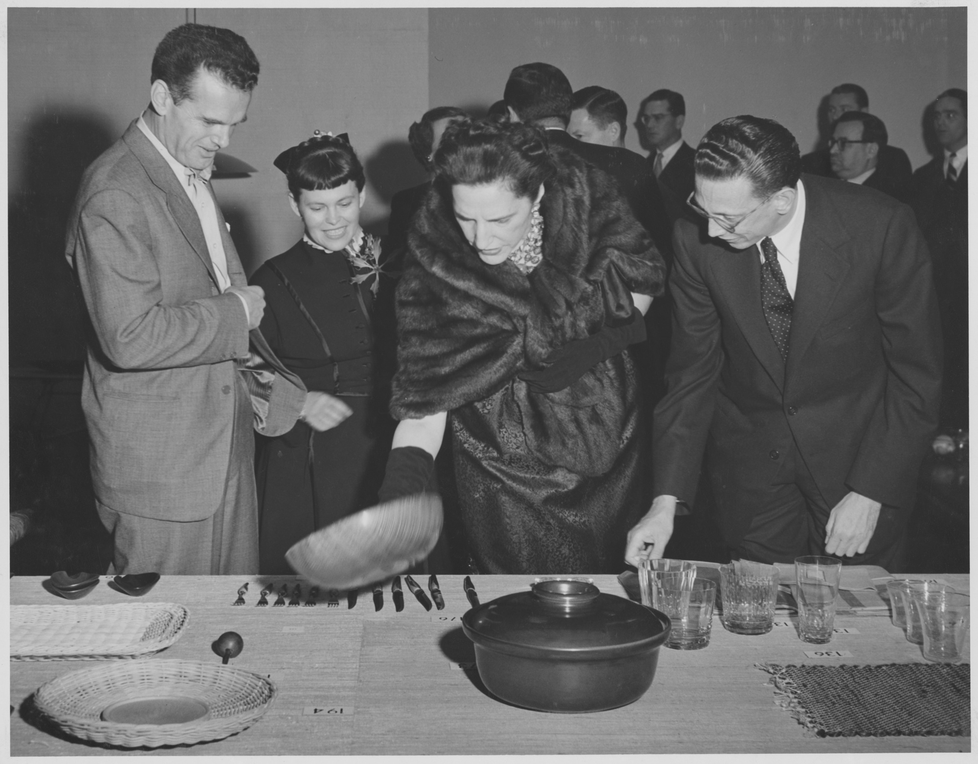 Charles and Ray Eames (left) and Edgar Kaufmann, Jr. (right) at Good Design, 1950